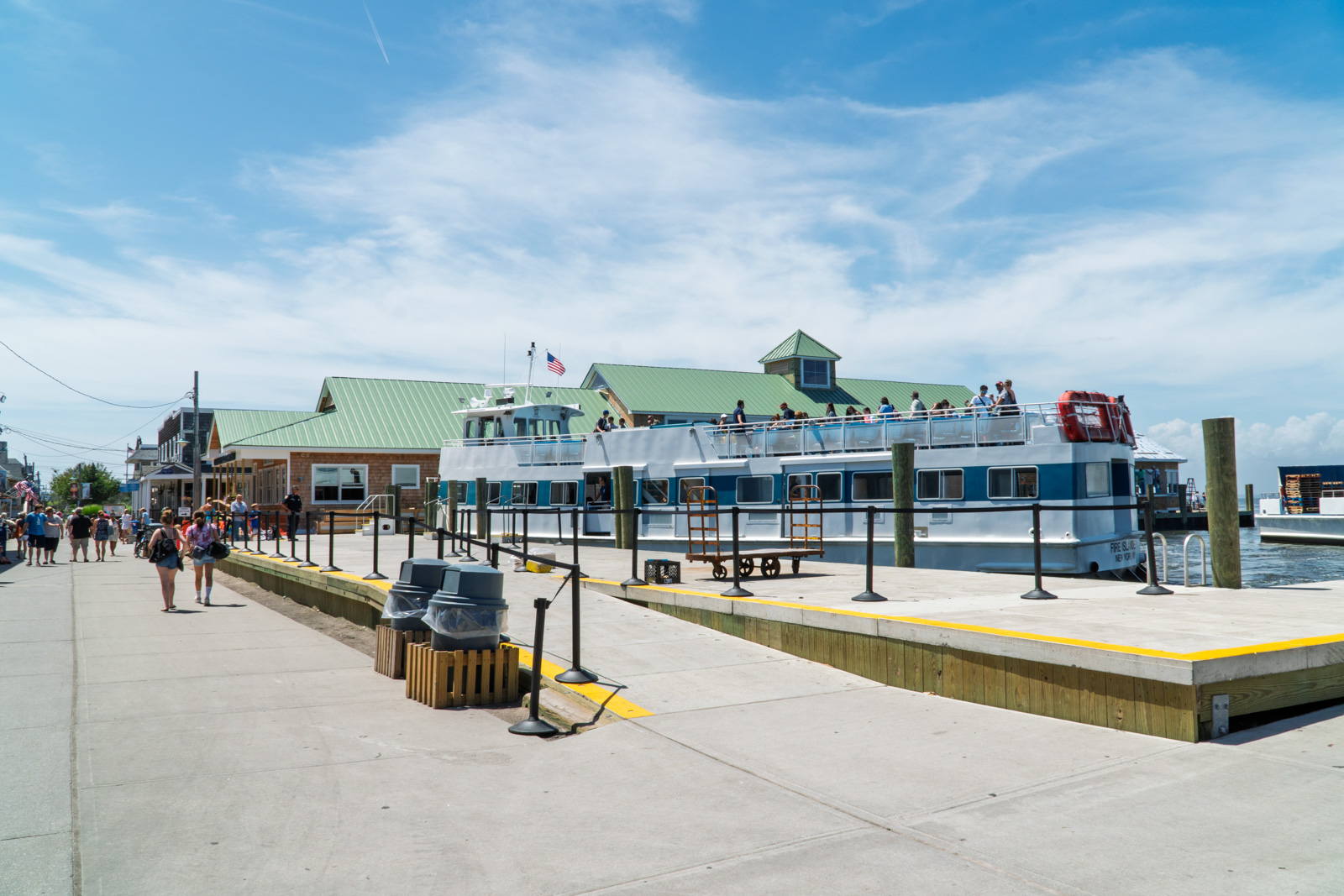 Ocean Beach dock with ferry loading in the foreground.